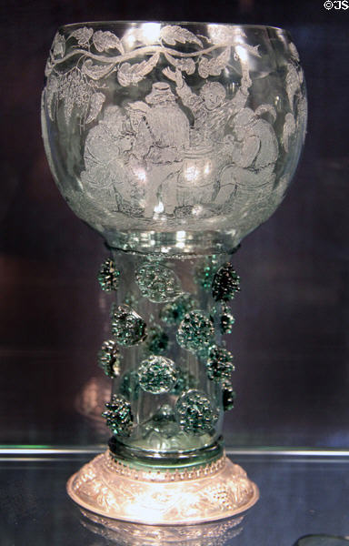 Netherlands glass Roemer (1650) with dancing peasants at Corning Museum of Glass. Corning, NY.