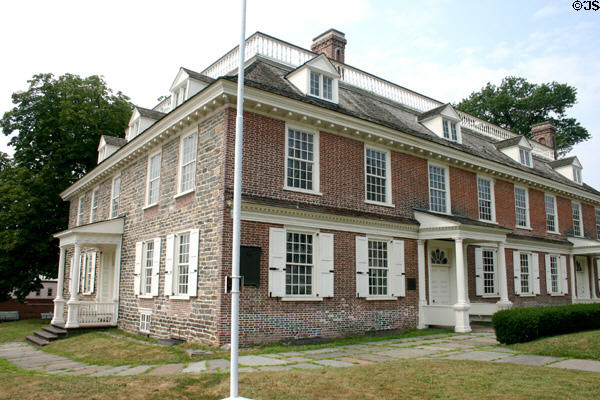 Philipse Manor has elements dating back to the 1650s though exterior reflects alterations made in the 18th C. Yonkers, NY. Style: Federal.