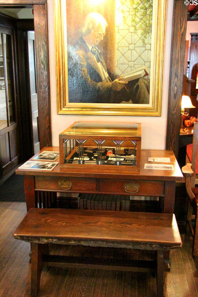 Portrait of Elbert Hubbard over Roycroft furniture at Elbert Hubbard Roycroft Museum. East Aurora, NY.