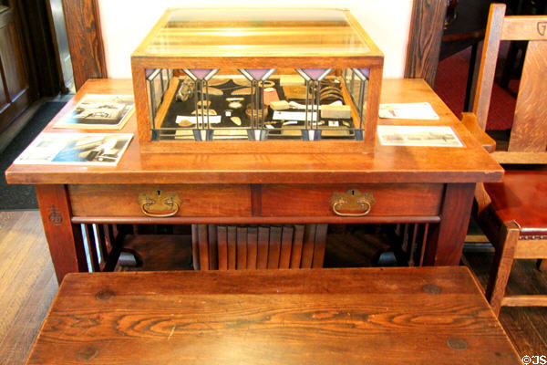 Roycroft display case on table at Elbert Hubbard Roycroft Museum. East Aurora, NY.