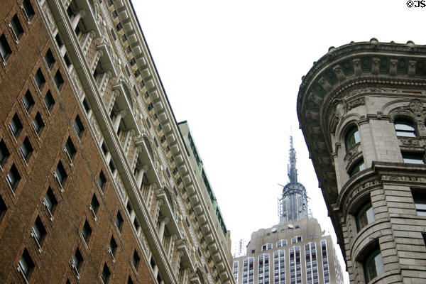 Herald Towers Apartments & Wilson Building frame Empire State Building. New York, NY.