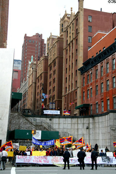 Demonstrators at steps leading down to United Nations Plaza from 43rd St. New York, NY.