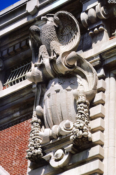 Sculpted eagle on cornice of Ellis Island National Monument. New York, NY.