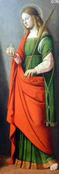 St Lucy with candle light detail of Three Saints painting (c1513) by Giovanni Battista Cima at Metropolitan Museum of Art. New York, NY.