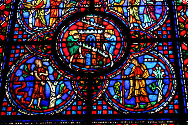 Stained glass window with Old Testament themes of Eve, Babel, & Jonah in Riverside Church. New York, NY.