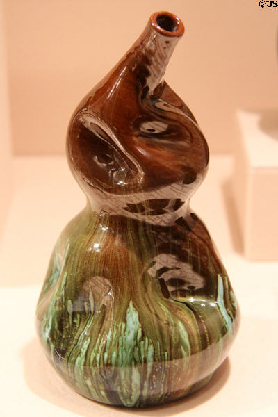 Earthenware gourd vase (c1880) by Christopher Dresser made by Linthorpe Pottery of Middlesborough, England at Metropolitan Museum of Art. New York, NY.