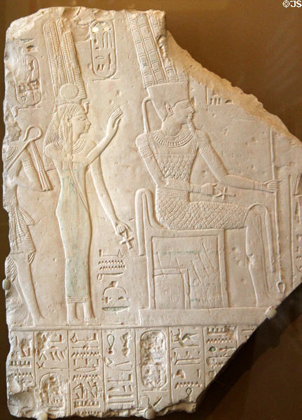 Egyptian relief of Amun, Ahmose-Nefertari, & King Amunhotep I (c1292-1190 BCE / Dynasty 19) from Deir el-Medina of Thebes at Brooklyn Museum. Brooklyn, NY.