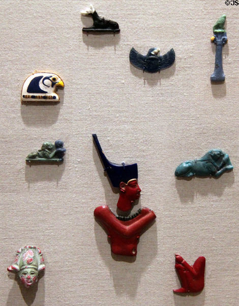 Egyptian glass inlays for funerary decoration (c525-30 BCE / Ptolemaic Dynasty) many from Saqqara at Brooklyn Museum. Brooklyn, NY.