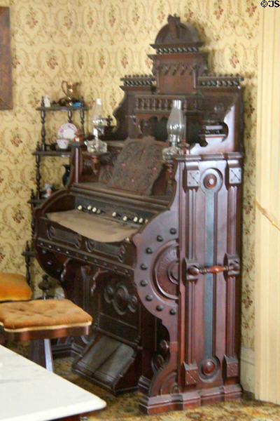 Organ in parlor in Layton Home at Old Bethpage Village. Old Bethpage, NY.