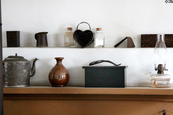 Kitchen containers & kerosene oil lamp in Layton Home at Old Bethpage Village. Old Bethpage, NY.