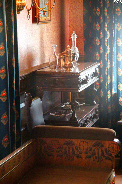 Side table & details of bench by Daniel Pabst & Frank Furness in dining room at Roosevelt's House Sagamore Hill NHS. Cove Neck, NY.