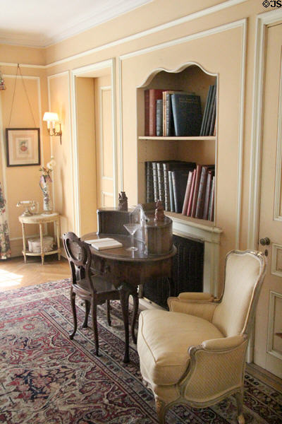 Peach guest room with writing desk at Vanderbilt Mansion. Centerport, NY.