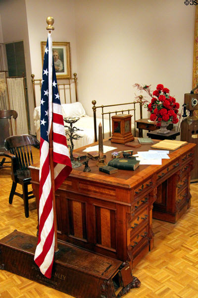 Partner's desk, one of McKinley's White House furnishings, along with 45 star flag & stand presented to President McKinley at William McKinley Presidential Museum & Library. Canton, OH.