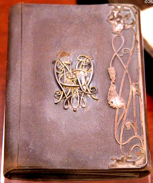 McKinley's monogrammed billfold in Art Nouveau style at William McKinley Presidential Museum & Library. Canton, OH.