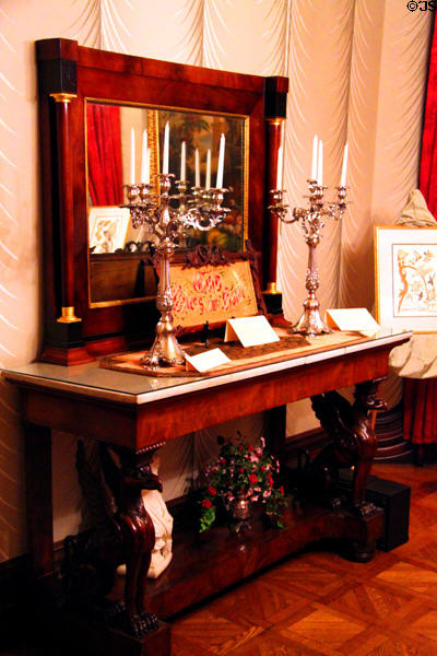Side table & mirror in music room at Hower House. Akron, OH.