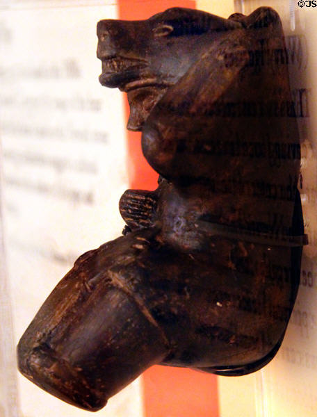 Prehistoric Indian stone carving of man in bear regalia (Wray Figurine) at Newark Circle Mound. Newark, OH.