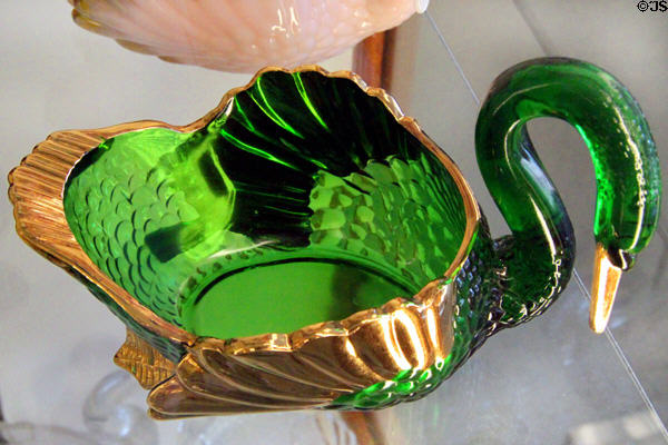 Forest green & gold glass swan at National Museum of Cambridge Glass. Cambridge, OH.