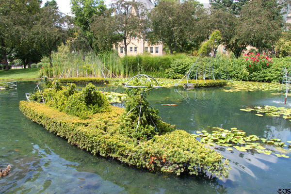 French Topiary Garden figure of boating on a pond. Columbus, OH.