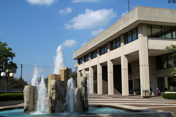 Modern government wing beside Miami County Courthouse with fountain. Troy, OH.
