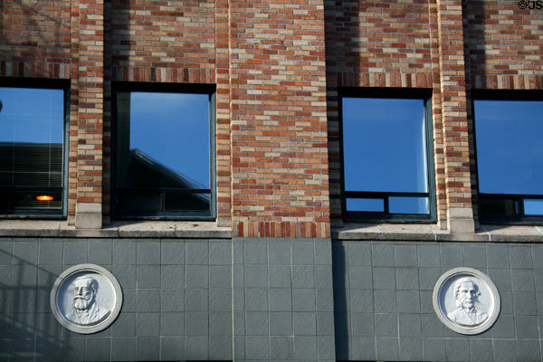 Medallions with doctor portraits on Medical Dental Building facade. Portland, OR.