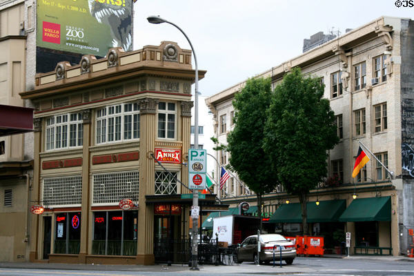 Streetscape at Burnside & Park Streets with flatiron building. Portland, OR.