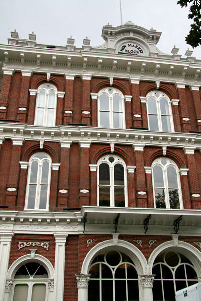 New Market Theater Venetian palace style with cast-iron front (1872) (50 SW 2nd Ave.). Portland, OR. Architect: Piper & Burton. On National Register.