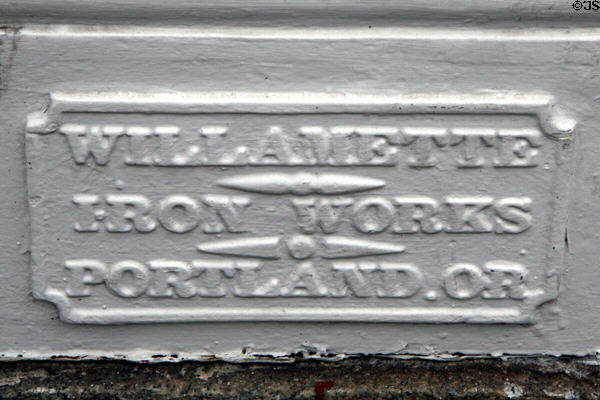 Cast iron maker's plate from Willamette Iron Works on Fechheimer & White Building. Portland, OR.