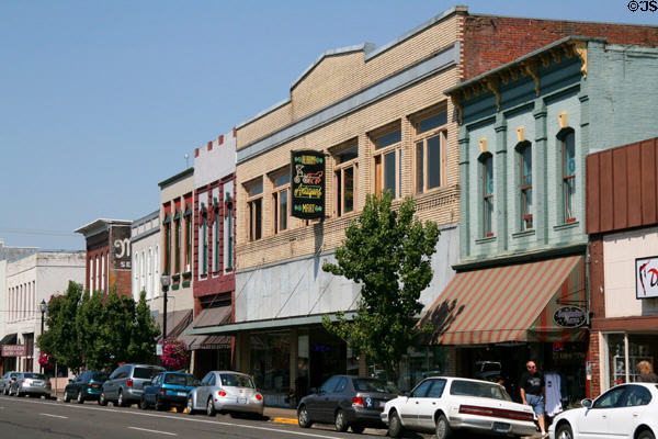 First Ave. Streetscape with #343 (1873), 333 (1875), 327 (1886) (former Linn County Bank), 325 (1890), 317 (c1915) by Charles Burgraff, & 311-313. Albany, OR.