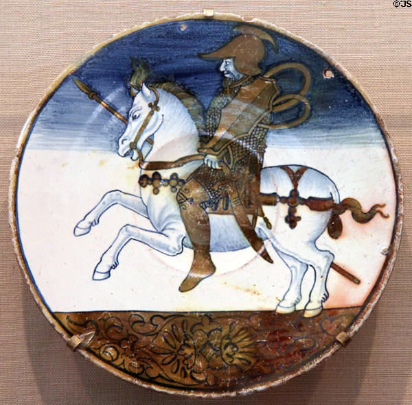 Earthenware plate with mounted knight design (c1500--50) from Deruta & Gubbio, Italy at Carnegie Museum of Art. Pittsburgh, PA.