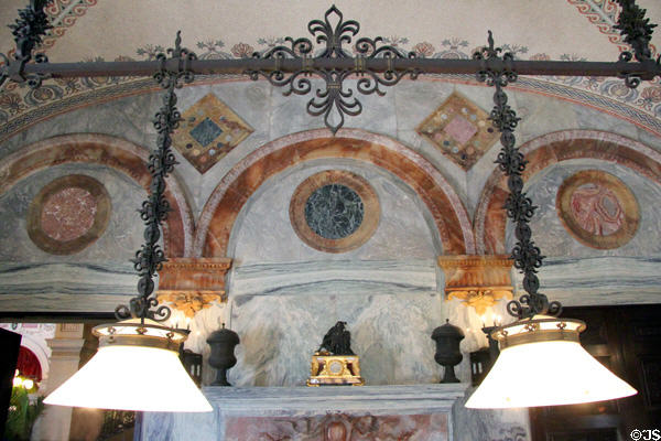 Massive lighting fixture of hand-wrought bronze above billiards table in Billiard Room at The Breakers. Newport, RI.