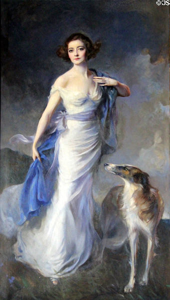 Portrait of woman in white with blue sash beside dog at Rosecliff. Newport, RI.