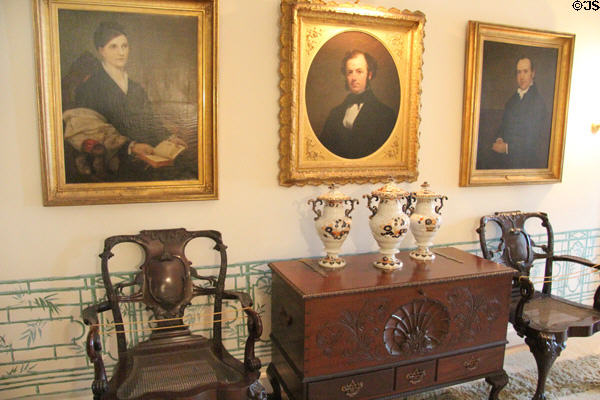 Upstairs hallway with portraits & antique furniture at Chepstow. Newport, RI.