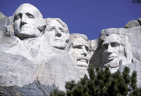 Mount Rushmore showing pine tree below. SD.