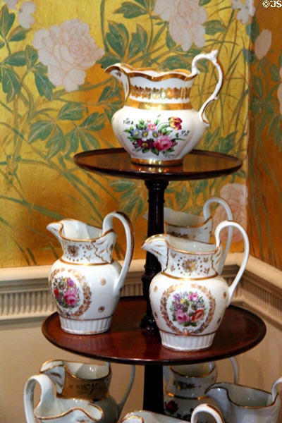 Porcelain pitchers on circular étagère at Bayou Bend. Houston, TX.