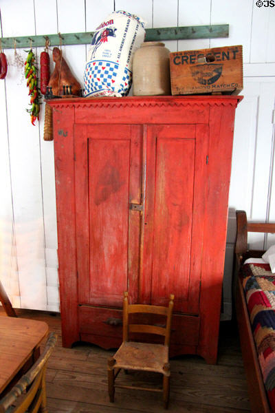 Cupboard, foodstuffs & bed at Nichols-Rice-Cherry House at Sam Houston Park. Houston, TX.