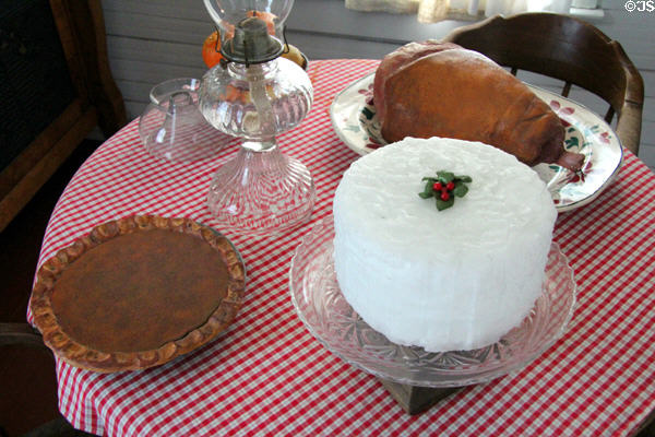 Food replicas on kitchen table in Yates House at Sam Houston Park. Houston, TX.