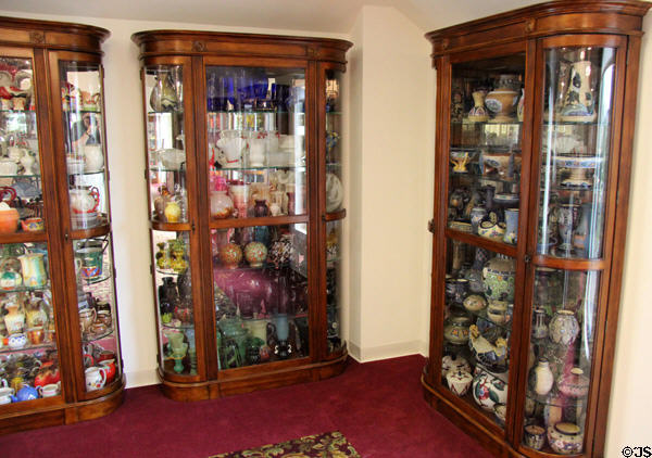 Vitrines with collection of Czech glass & ceramics at Czech Cultural Center. Houston, TX.