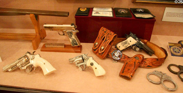 Pistols, holster, badges & cuffs which belonged to Texas Ranger Marvin M. Stetler at Buckhorn Museum. San Antonio, TX.