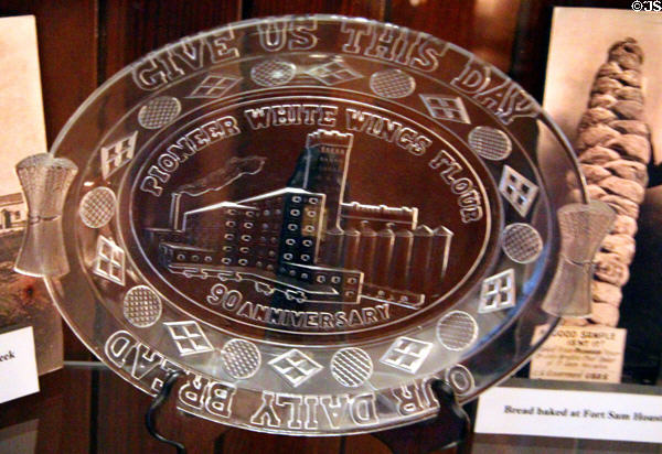 Pressed glass plate commemorating 90th anniversary of Pioneer White Wings Flour of San Antonio at Guenther House Museum. San Antonio, TX.