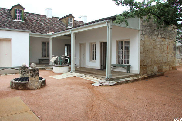 Rear courtyard with well, house & kitchen buildings at Casa Navarro State Historic Site. San Antonio, TX.