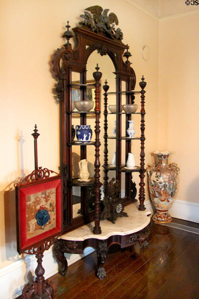 Display shelf with collection of ceramics at Edward Steves Homestead Museum. San Antonio, TX.