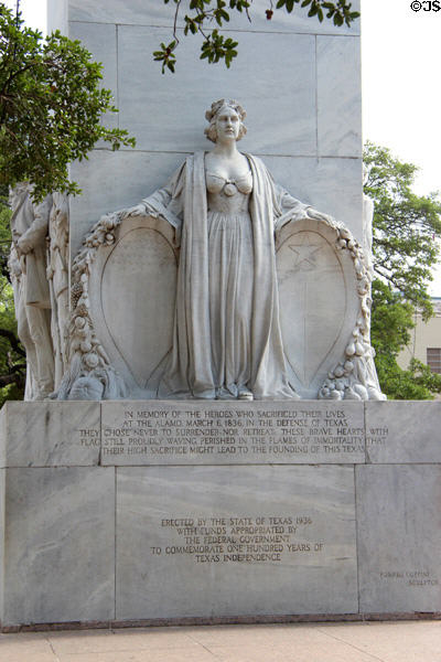 Female symbol of Texas holding shields of Texas & United States on north panel of Alamo Cenotaph. San Antonio, TX.