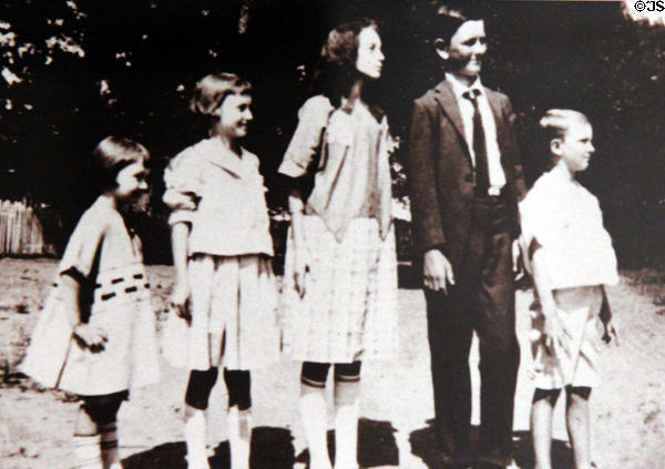 Photo of future President Lyndon B. Johnson with brother & sisters at LBJ Boyhood Home. Johnson City, TX.