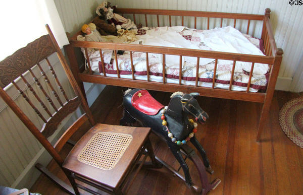 Rocking chair, child's bed & rocking horse at Sauer-Beckmann Farmstead. Stonewall, TX.