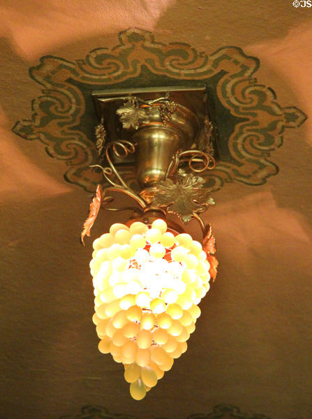 Art Nouveau grape cluster light fixture in breakfast room at McFaddin-Ward House. Beaumont, TX.