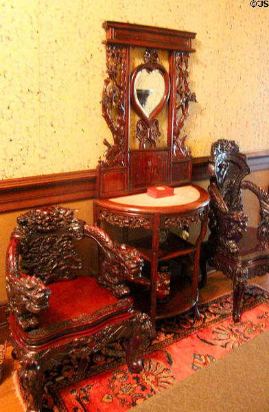 Carved Chinese furniture in hall at McFaddin-Ward House. Beaumont, TX.