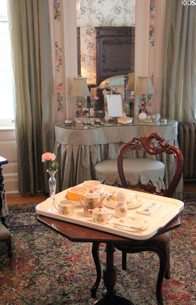 Bedroom with floral wallpaper at McFaddin-Ward House. Beaumont, TX.