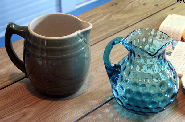 Glass & stoneware pitchers at Chambers House Museum. Beaumont, TX.