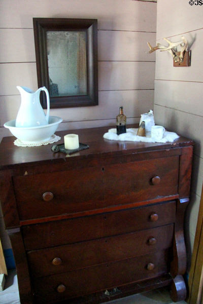 Bureau with bleeding horn on top in John Jay Junior's bedroom at John Jay French Museum. Beaumont, TX.