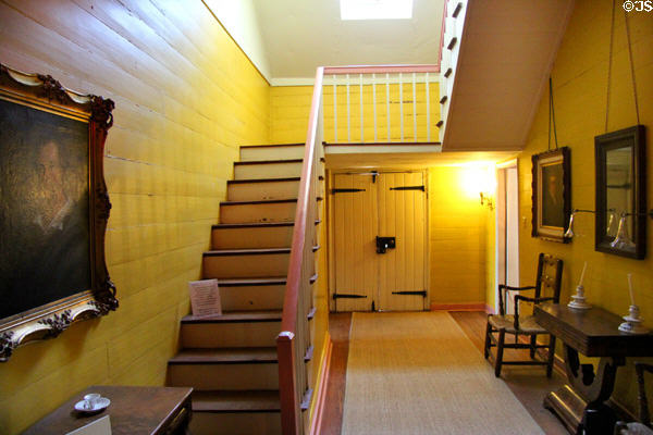 Central hall with staircase to second floor attic at French Legation Museum. Austin, TX.